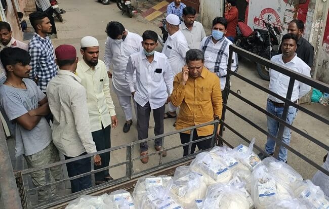 AIMIM MLA Kausar Mohiuddin distributes ration kits through Access Foundation in his constituency