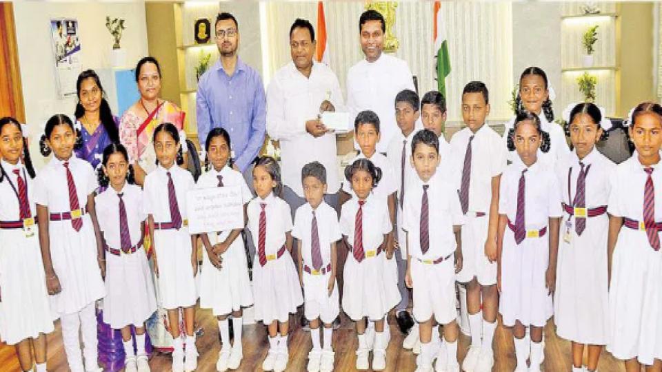 School kids donates Rs 35,000 for flood relief in Khammam