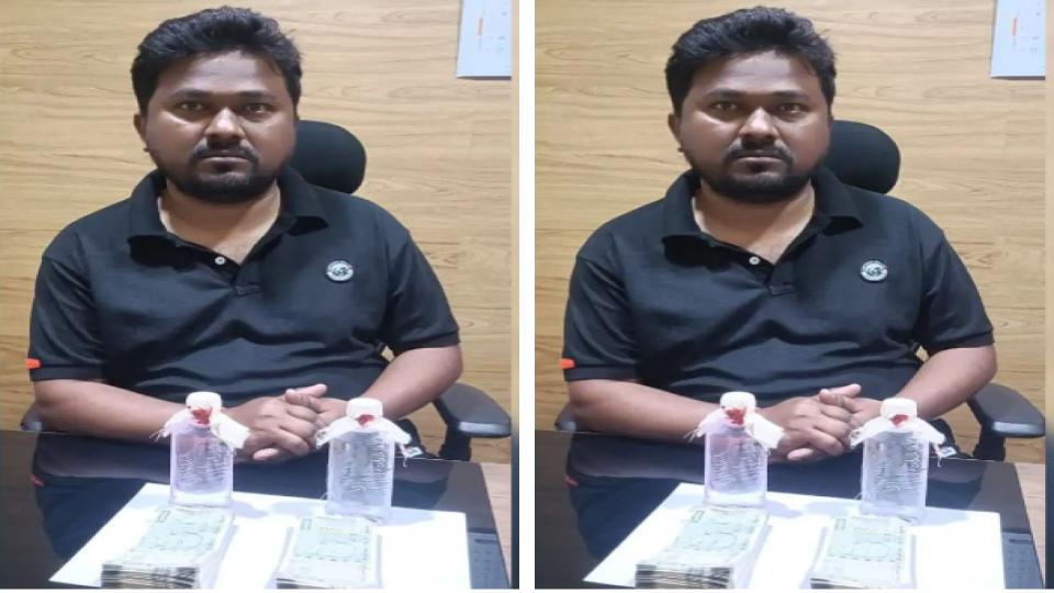 BC commission worker caught red handed taking Rs 1L bribe in Telangana