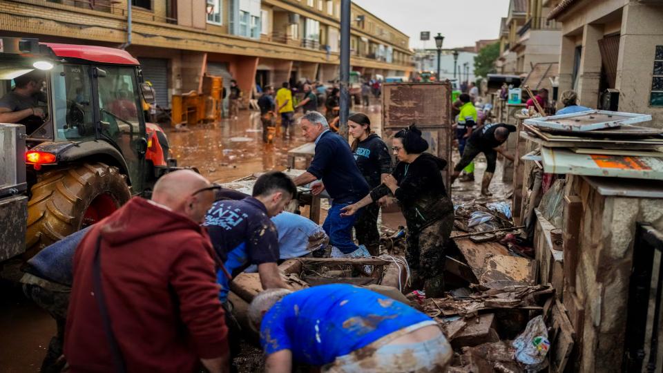 Spain searches for bodies after flood of the century claims at least 95 lives