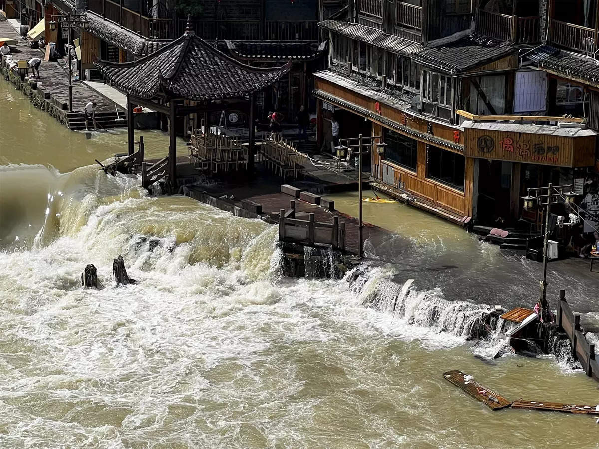 Death Toll Rises To 14 In Rain-Triggered Flash Flood In Sichuan Province, China 