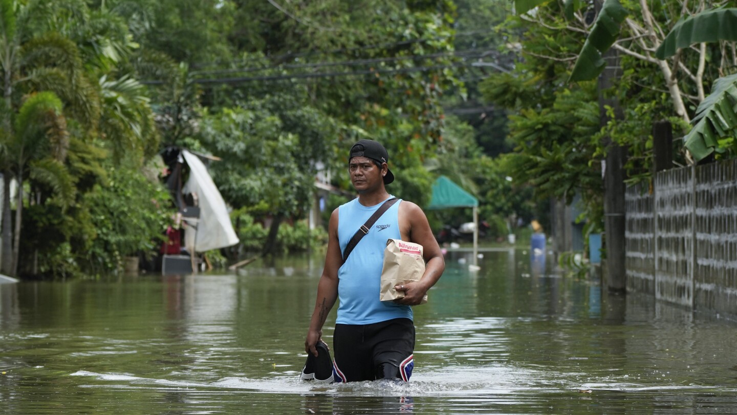  Death toll rises to 81 as tropical storm Trami causes flooding in Philippines