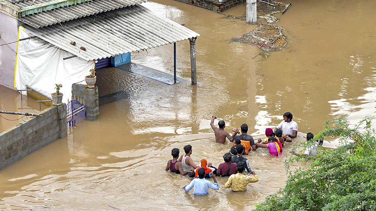 Andhra Pradesh CM Aerially Surveys Eluru Flood Areas